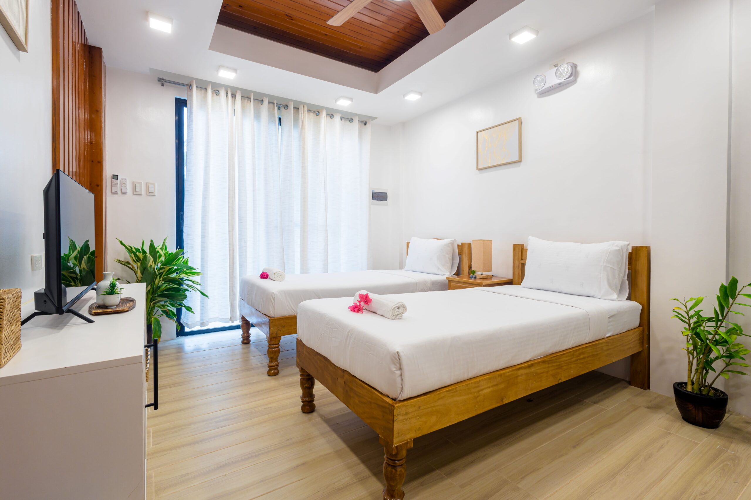 Superior Room combines elegance and comfort with a spacious design, featuring a king-size bed perfect for relaxation or work, complete with a sleek ensuite bathroom and toiletries.